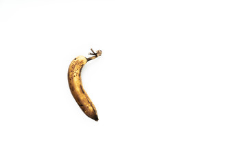 Rotten banana on a white background