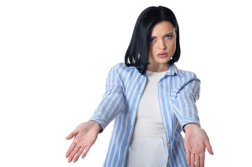 Portrait of smiling young woman gesturing isolated