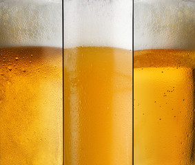 Background three different types of beer with foam in a glass with water drops and beautifully rising bubbles