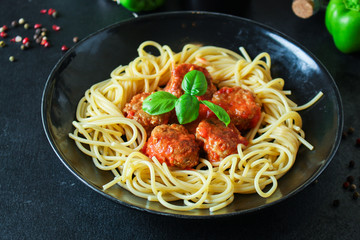pasta spaghetti meatballs and tomato sauce Menu concept food background top view copy space