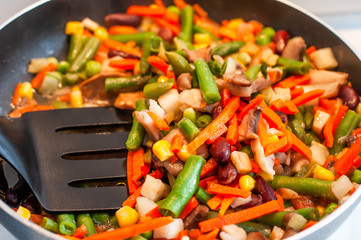 A versatile and affordable instant mix of frozen vegetables in a pan