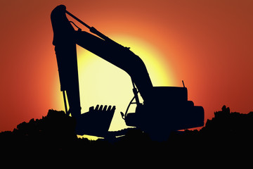 Silhouette image excavators are digging the soil in the construction site on the sky sunset  background