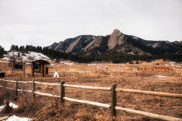 Boulder, Colorado - January 16, 2020: Flatiron mountains view  in the entrace of the Chautauqua Park in Boulder, Colorado