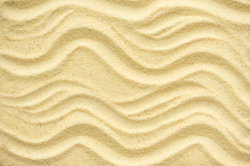 Empty sand on the beach. Summer background. Top view