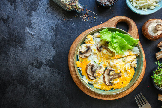 Scramble Fried Eggs
Omelet Mushroom Concept Healthy Eating. Food Background Top View Copy Space For Text Keto Or Paleo