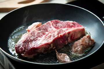 Wagyu Japanese beef steak frying on the pan