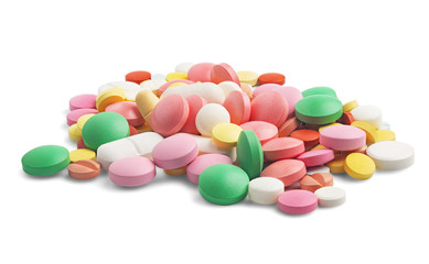 pile of medical pills on isolated white background. Pattern for design.