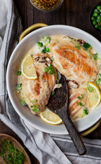 chicken breast with cream sauce and broccoli