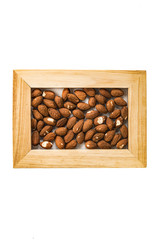 almond nuts in a photo frame isolate on a white background