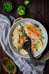 chicken breast with cream sauce and broccoli