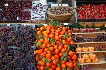 Fresh fruits and nuts on farmer agricultural market