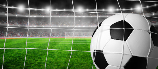 Soccer ball  goal concept on stadium