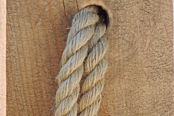 thick durable braided rope rough ragged surface of the board