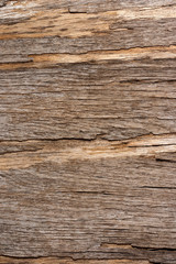 Fototapeta premium The texture of old wood is naturally aged with a beautiful pattern. Vertical orientation