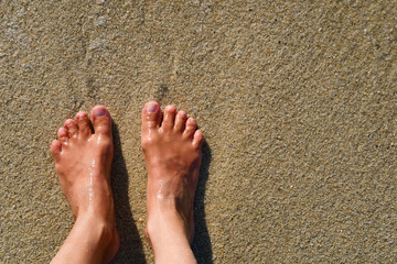 A feet on the sand