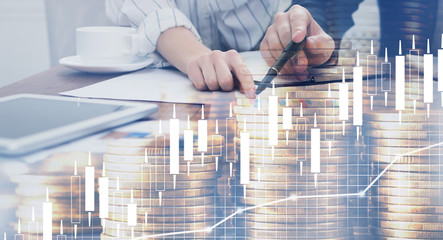 Collage of business team working in office, stacked golden coins and economic data on imaginary screen
