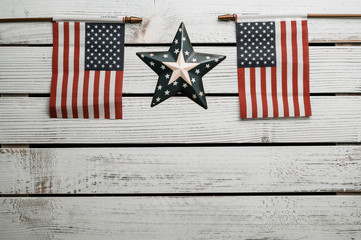 American stars and stripes flat lay over rustic wood background 4th of July memorial day in...