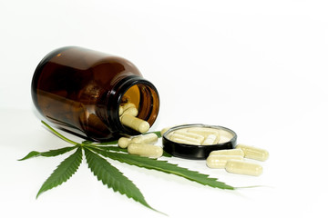 marijuana pills on a white background