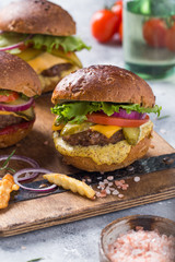 Delicious grilled burgers and fries 