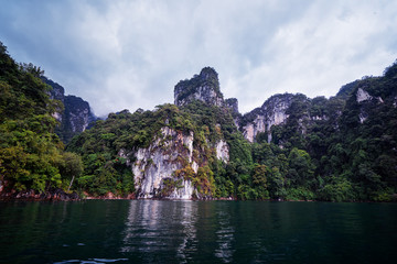Fototapeta na wymiar Beautiful landscape with lake, mountains and natural attractions on Cheow Lan Lake at Khao Sok National Park, Surat Thani Province, Thailand.
