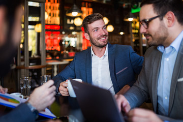 Group of businessmen on business meeting