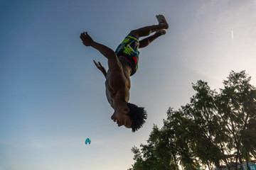 Young Attractive Muscular and Strong Athletic Black African Man at the White Sand Beach Training...