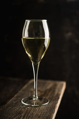 White wine on the rustic background. Selective focus. Shallow depth of field.
