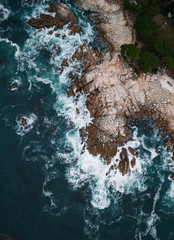 Lone Cypress tree scenic aerial view along famous 17 Mile Drive road in Monterey.