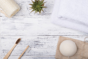 Zero waste concept. Top above overhead view photo of  eco bath products isolated on white wooden background