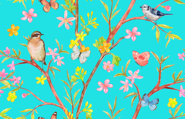 seamless texture with stylized spring trees with pink and yellow flowers. birds sitting on branches and flying butterflies around. watercolor painting