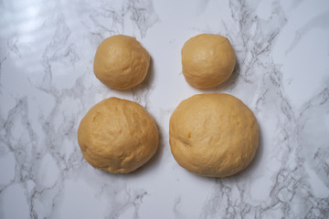 Process of cooking Easter cake cruffin, decorated with dried fruit and nuts