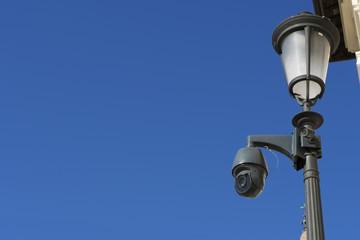 CCTV cameras in vintage lamp. A combination of modern and vintage for citizen security