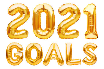 2021 GOALS phrase made of golden inflatable balloons. New year resolution goal list, change and determination concept. Helium balloons foil letters and numbers, celebration decoration