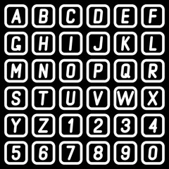 Alphabet and numbers on a dark background.