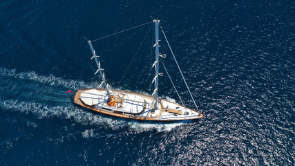 Aerial drone photo of sail yacht sailing the Aegean deep blue sea, Greece
