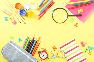 Naklejka premium School office on a colored background top view. Office office, student office. Concept back to school. place for text. Flatlay 