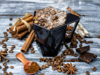 Black cup of coffee, dark background