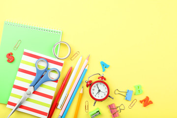 School office on a colored background top view. Office office, student office. Concept back to school. place for text. Flatlay
