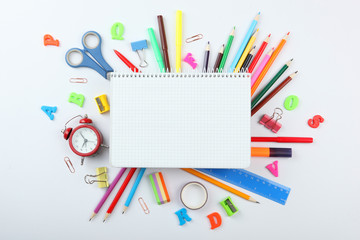 School office on a colored background top view. Office office, student office. Concept back to school. place for text. Flatlay
