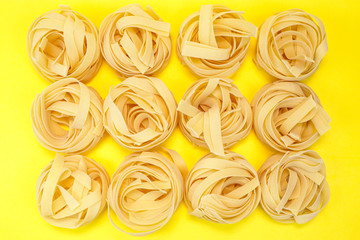 Background from pasta. Lozany. Natural product for making pasta. Close-up. Concept for food advertising.