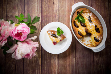 sweet homemade casserole with fruits inside in a plate