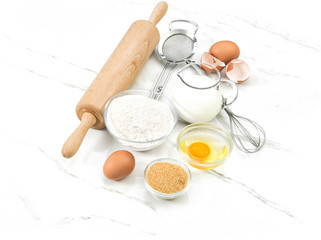 Kitchen tools food ingredients eggs flour sugar milk Dough preparation