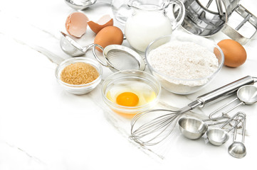 Kitchen tools food ingredients eggs flour sugar milk Dough preparation