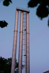 Energy plant chimney rising towards the sky