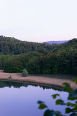 Landscape of a lake with hills in the horizon