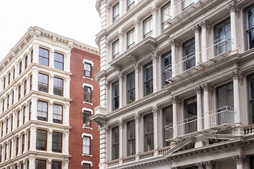 View of row of classic New York City apartment buildings in SoHo Manhattan - obrazy, fototapety, plakaty