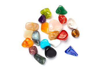 different natural precious gemstones colororph. top view, on a white background .isolated .close up