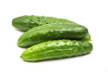 Fresh vegetables. Middle cucumbers on a white isolated background.