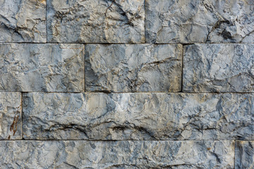 Wall texture. Gray rectangular stones. Horizontal and vertical lines. Texture.