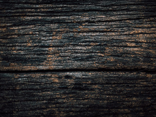 Old dark natural wood flooring, horizontal wood grain